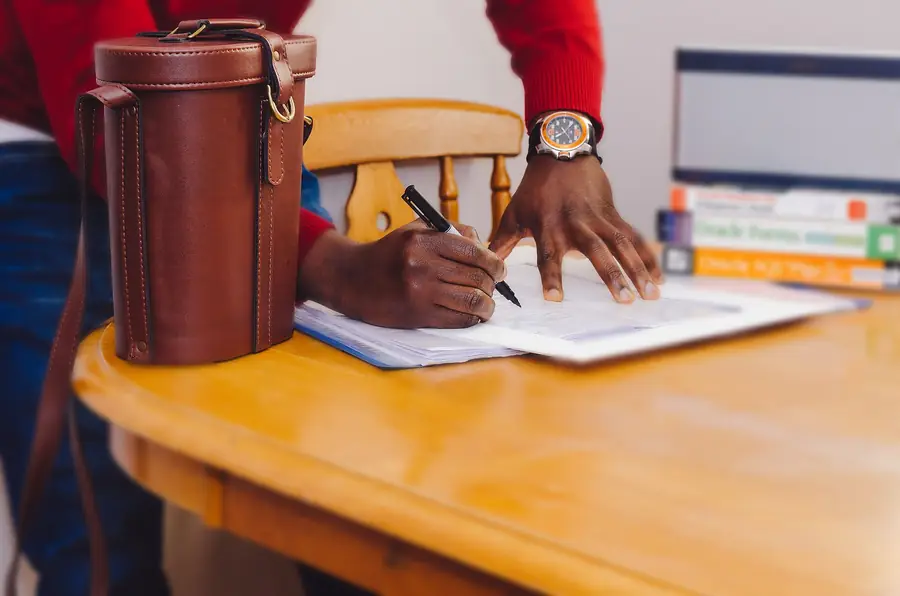 Academic writer composing an assignment