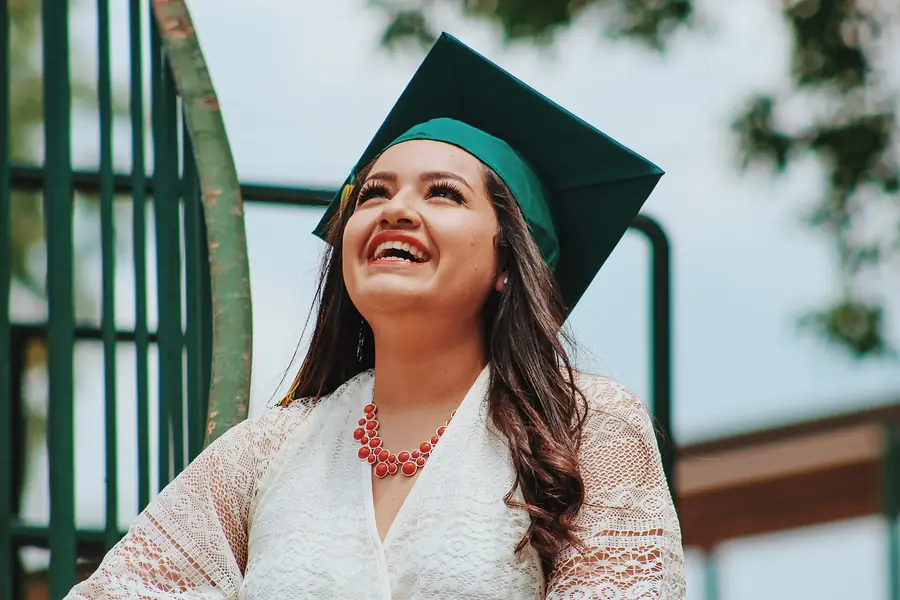 Happy graduate celebrating results