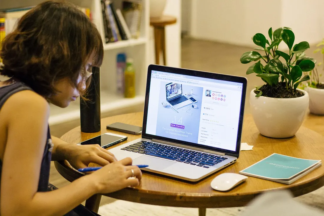 Student working on an assignment at a laptop