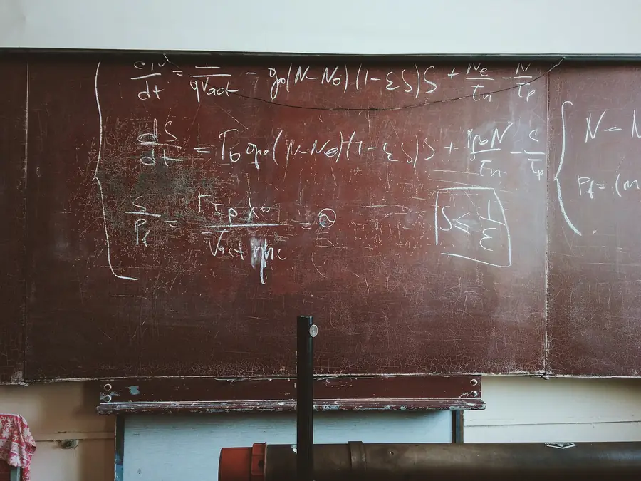 Mathematical formulas on a blackboard